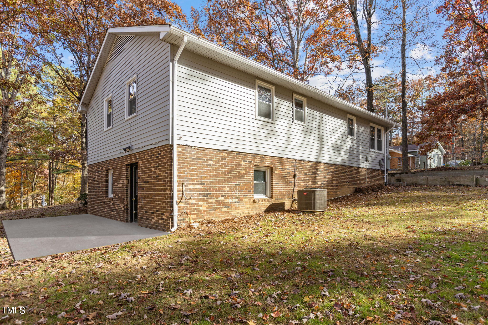 6415 Whitt Road Durham, NC 27712 - Photo 36 of 37 a view of a house with a yard