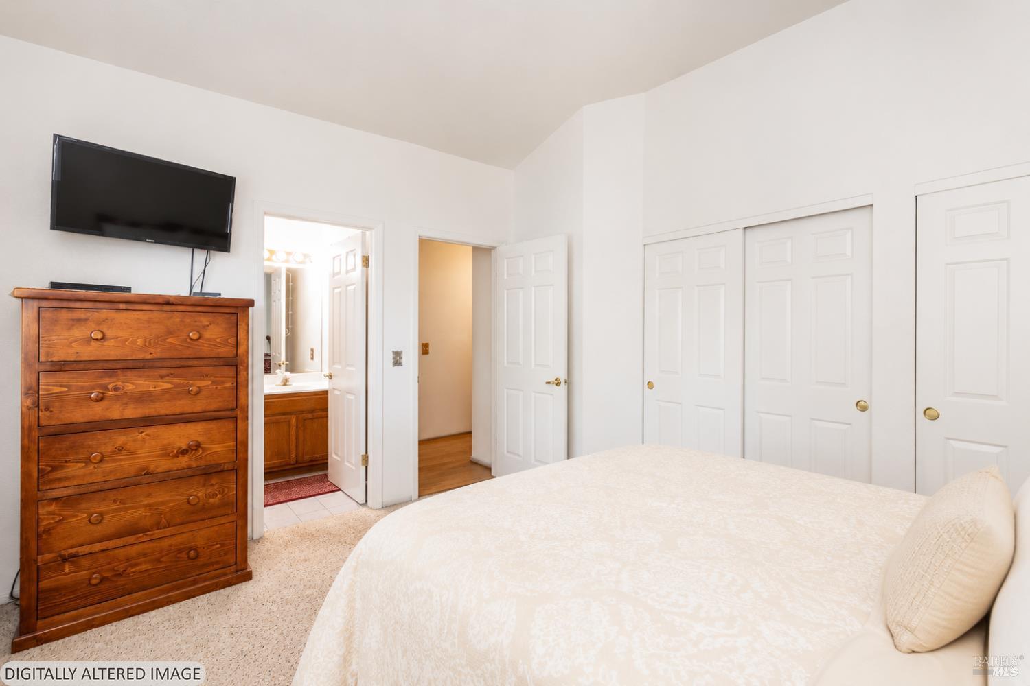1935 Seville Street Santa Rosa, CA 95403 - Photo 12 of 30 a bedroom with a bed and a flat screen tv