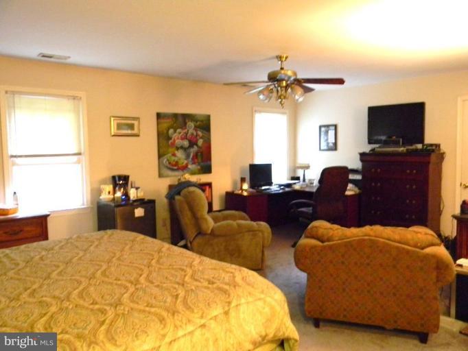 8067 Counselor Road Manassas, VA 20112 - Photo 13 of 30 Master Bedroom with large sitting area