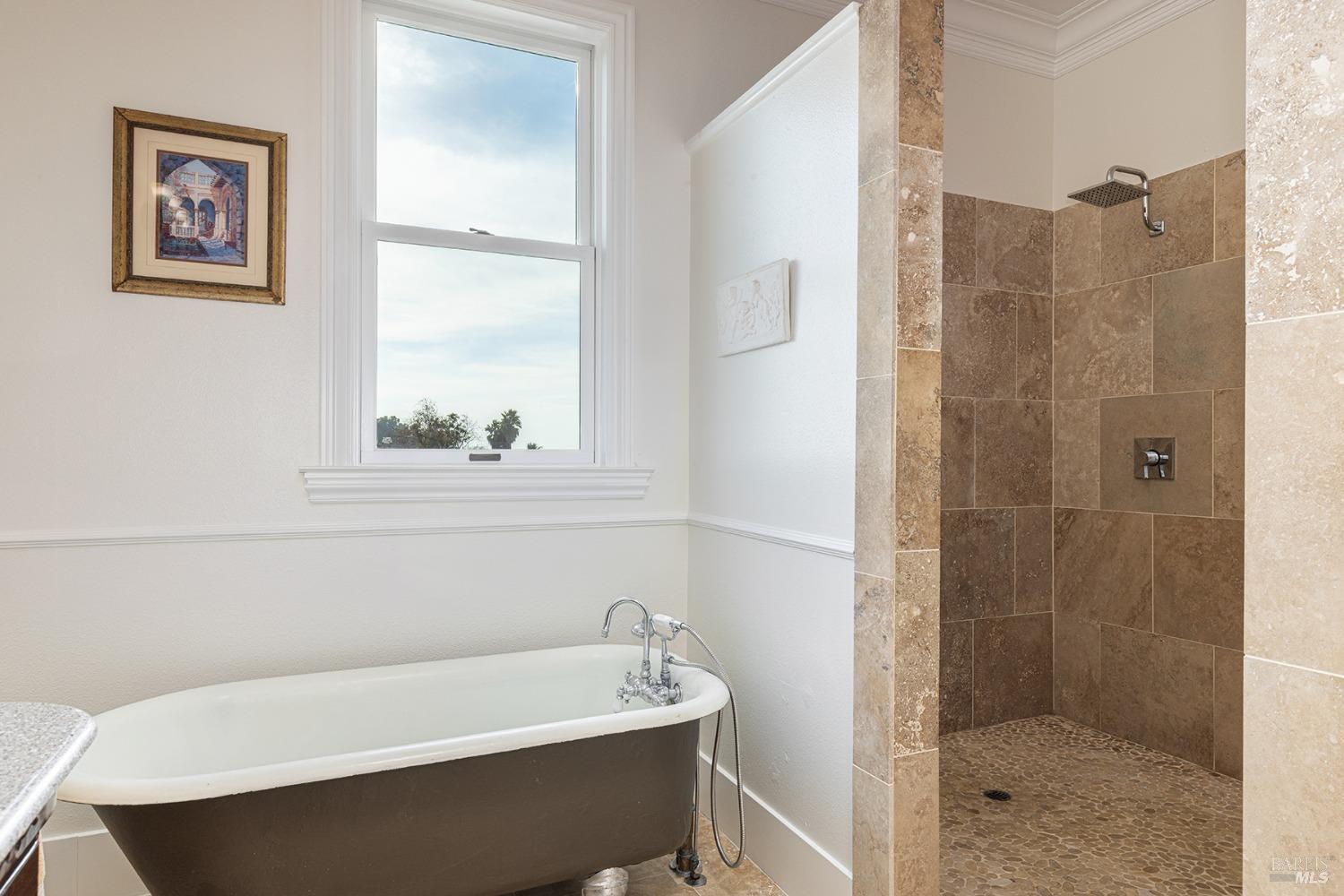 1730 Milton Road Napa, CA 94559 - Photo 52 of 77 a bathroom with a bathtub and a shower