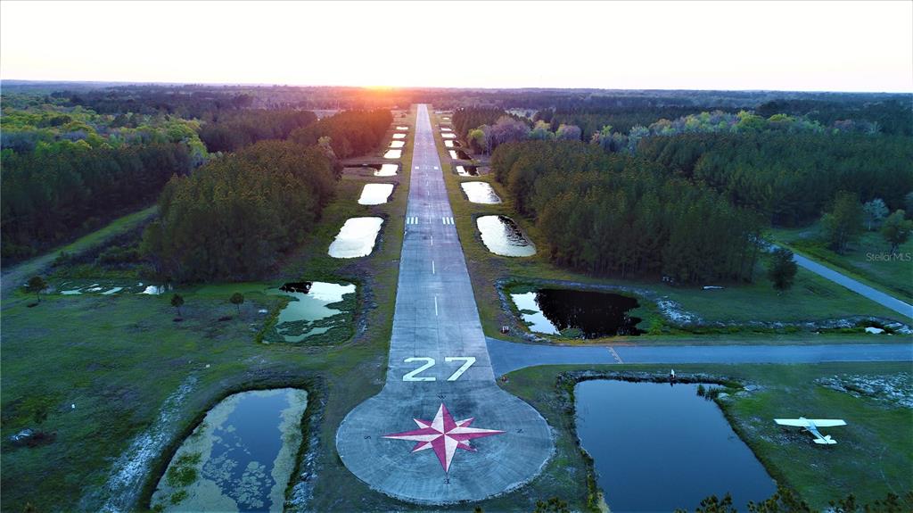2 Southwest 128th Road Lake Butler, FL 32054 - Photo 2 of 4 an aerial view of a house with yard swimming pool and outdoor seating