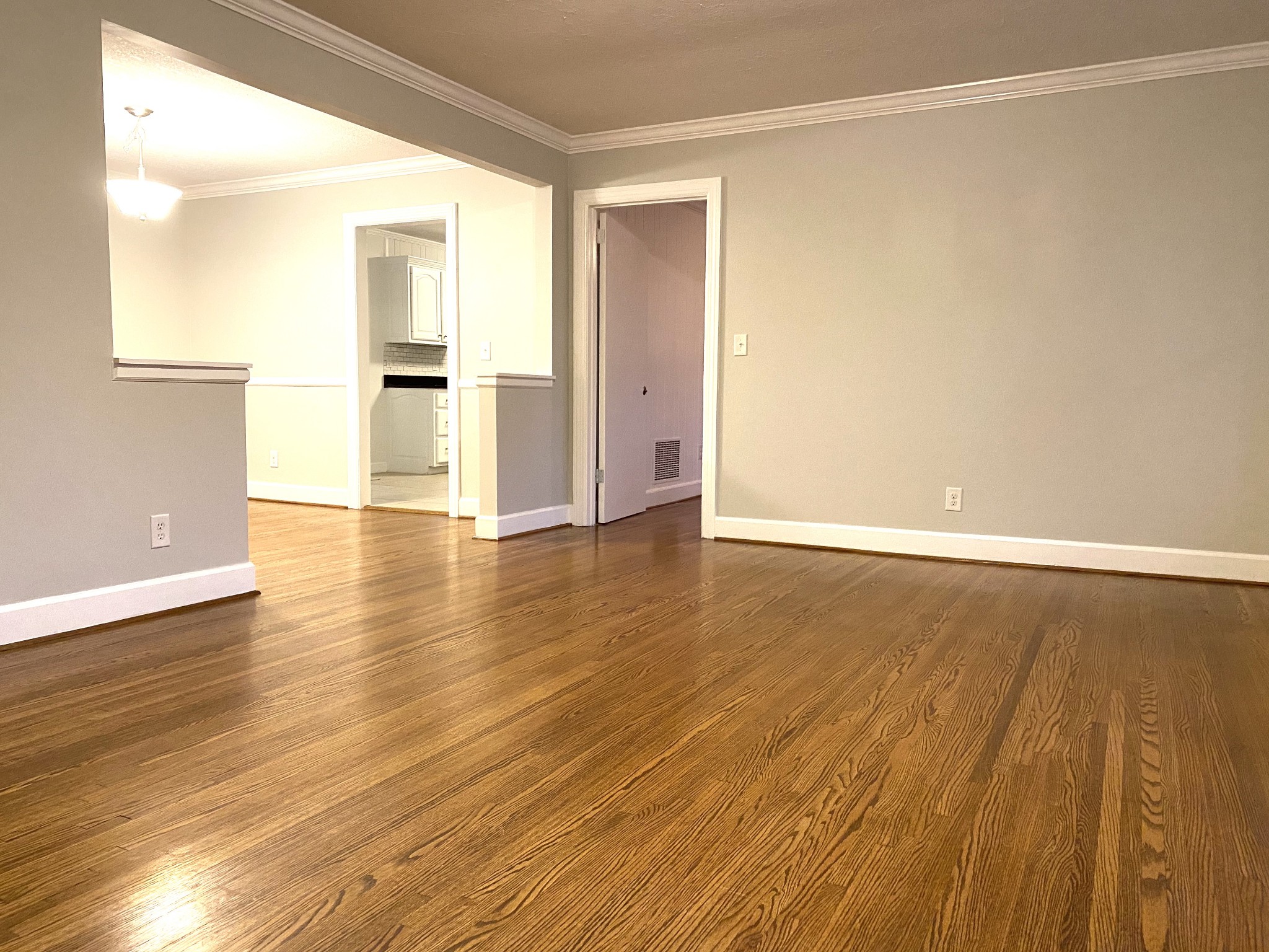 500 Vantrease Road Madison, TN 37115 - Photo 10 of 45 an empty room with wooden floor and windows