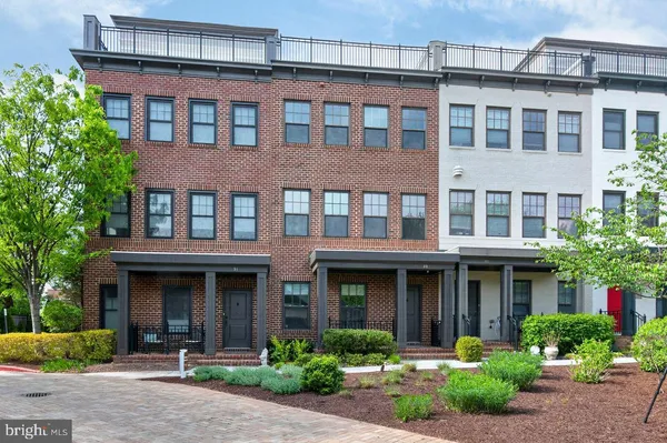 a view of a large building with a yard