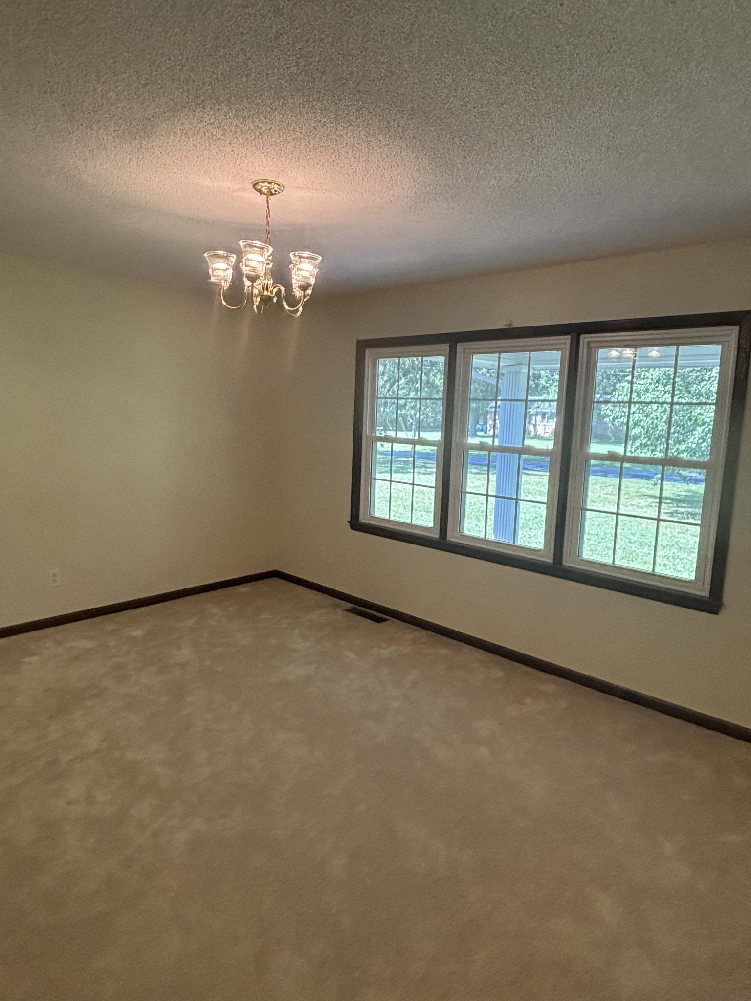 141 Doak Road Manchester, TN 37355 - Photo 17 of 41 wooden floor in an empty room with a window
