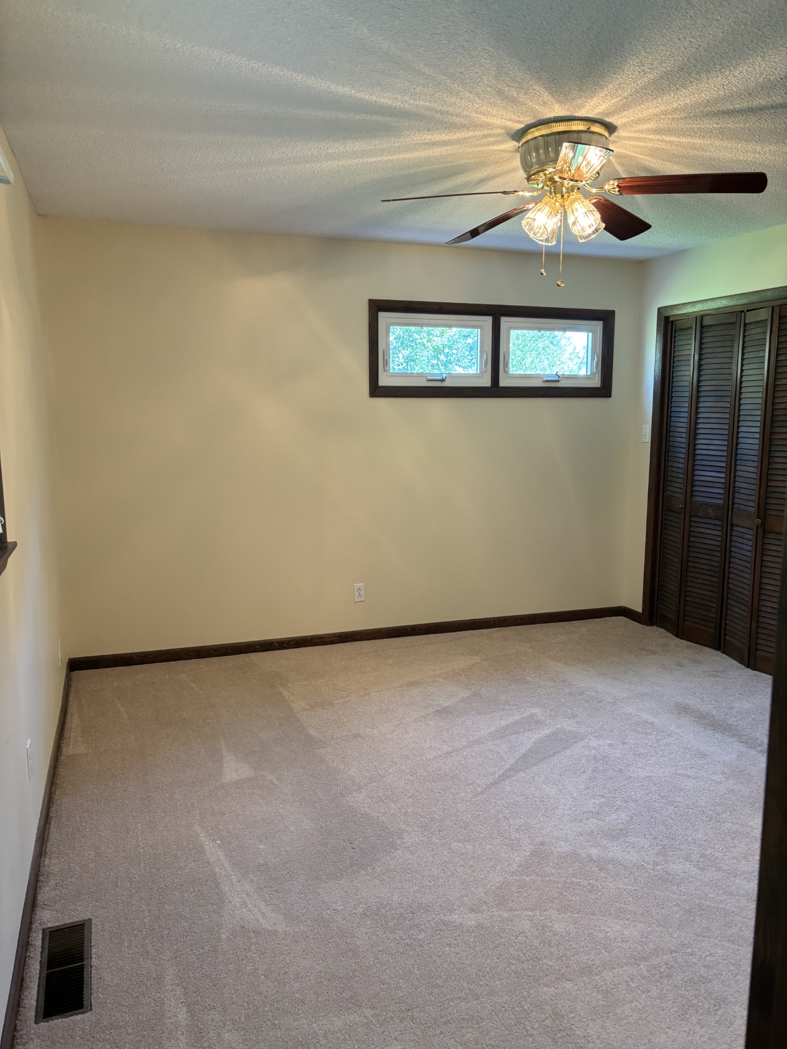 141 Doak Road Manchester, TN 37355 - Photo 18 of 41 a view of an empty room with a chandelier fan