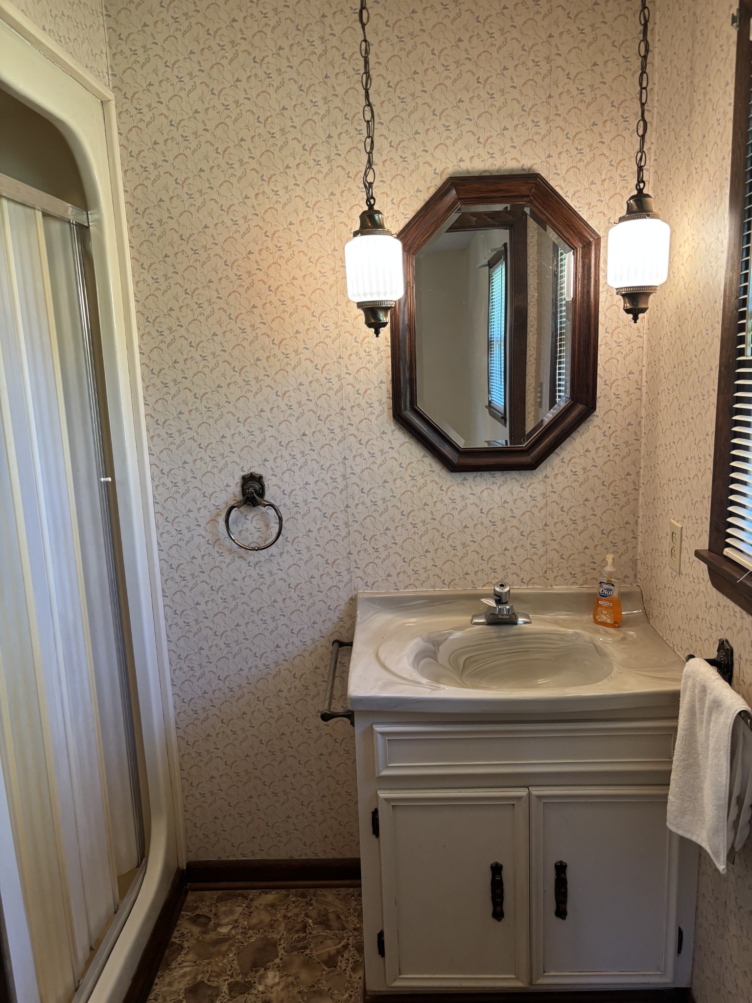 141 Doak Road Manchester, TN 37355 - Photo 21 of 41 a bathroom with a sink a mirror and vanity