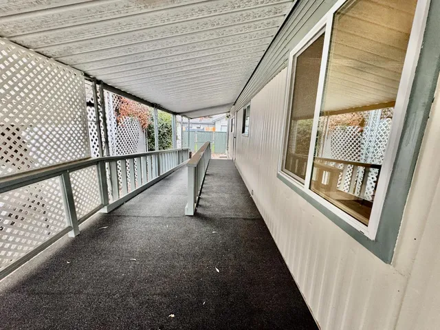 a view of staircase with large window
