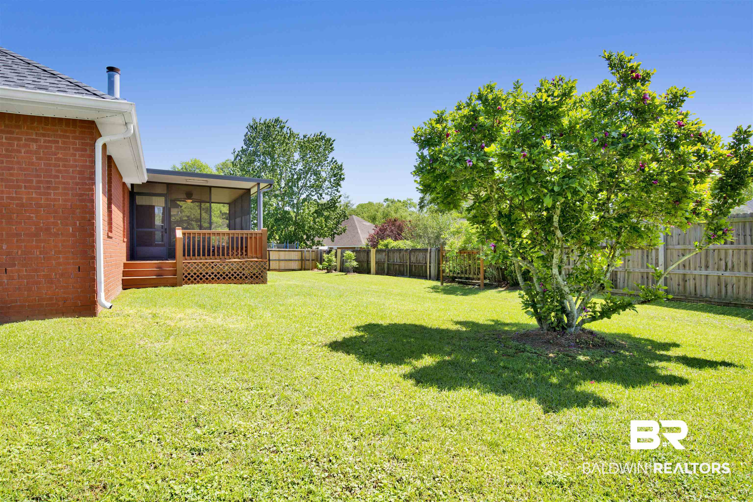 16102 Masada Court Loxley, AL 36551 - Photo 10 of 35 View of yard with a fenced backyard and a sunroom