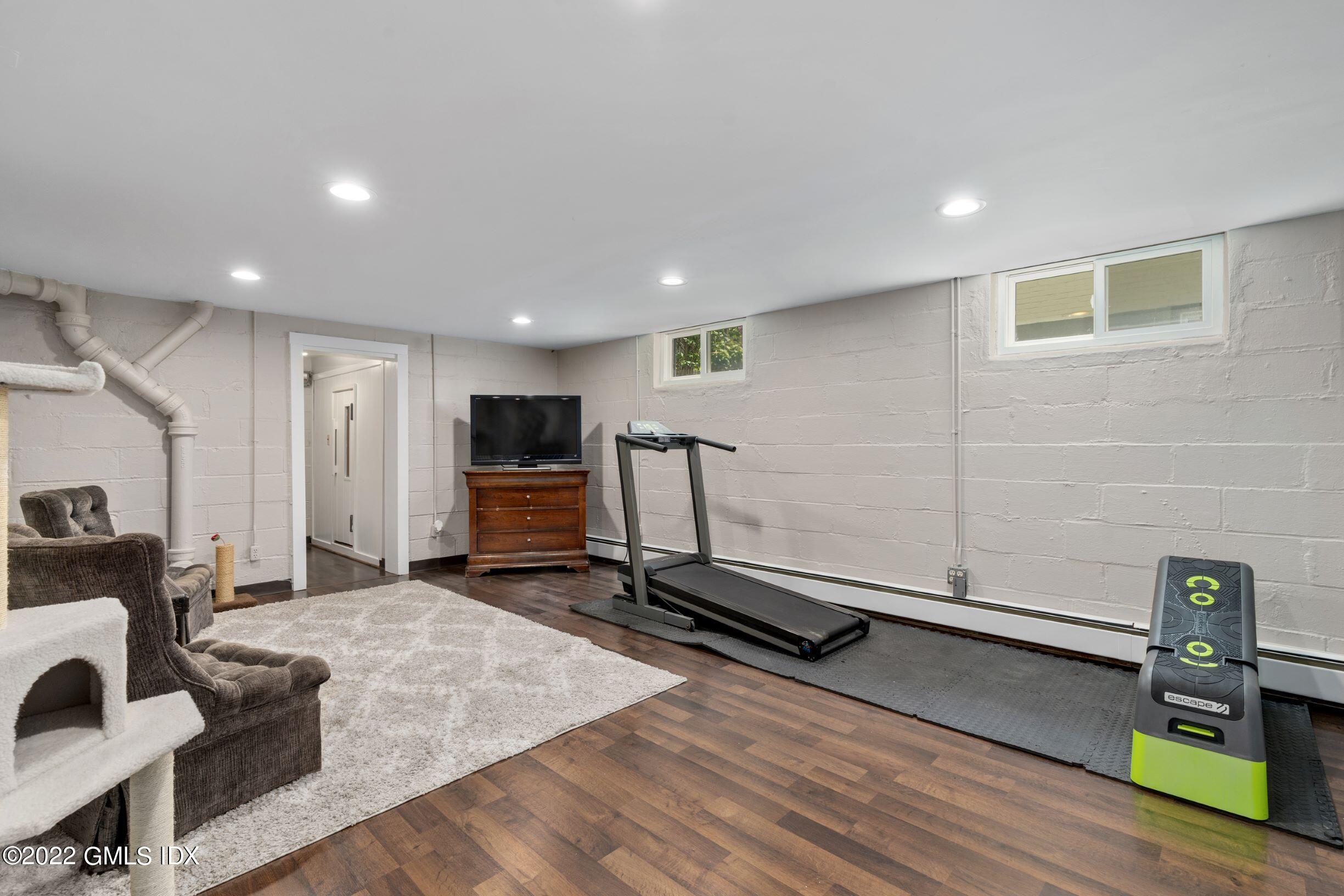 23 Manor Road Old Greenwich, CT 06870 - Photo 16 of 25 a view of a room with gym equipment