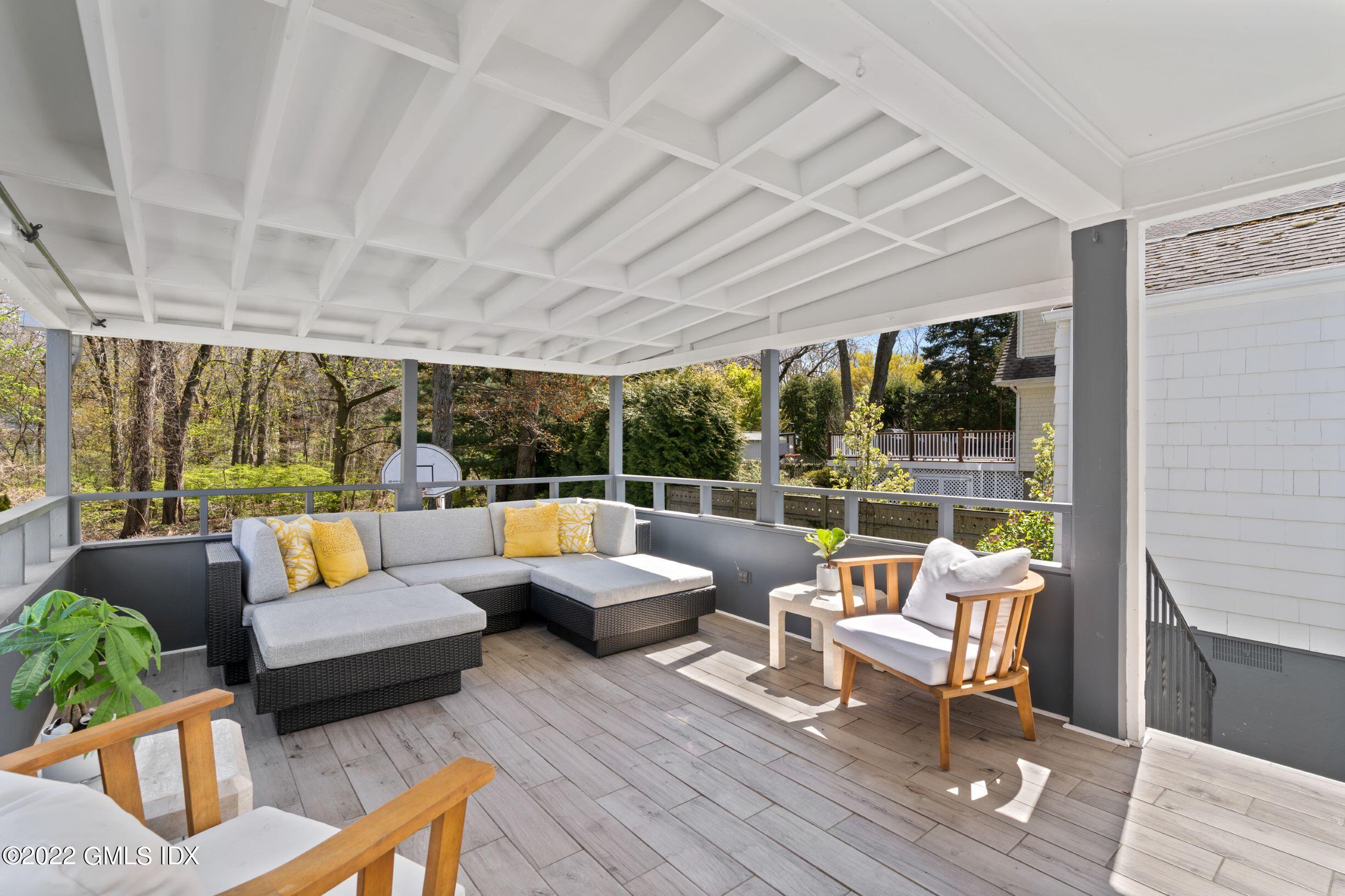 23 Manor Road Old Greenwich, CT 06870 - Photo 20 of 25 a outdoor living space with furniture and garden view