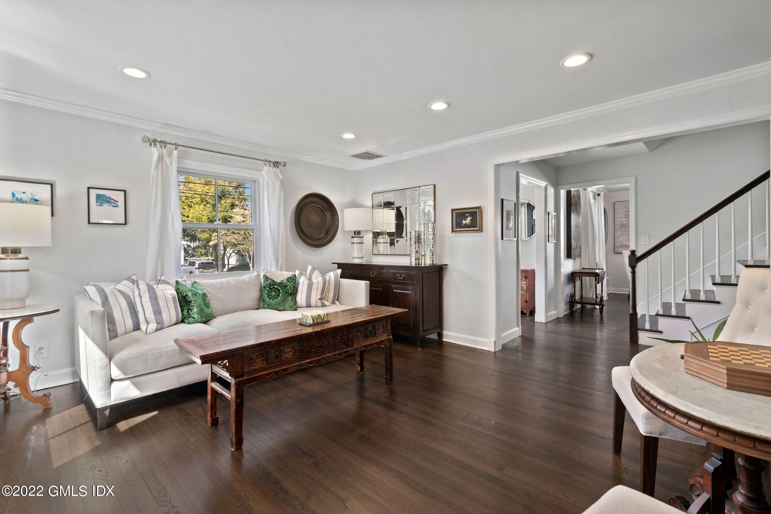 23 Manor Road Old Greenwich, CT 06870 - Photo 2 of 25 a living room with furniture and a wooden floor