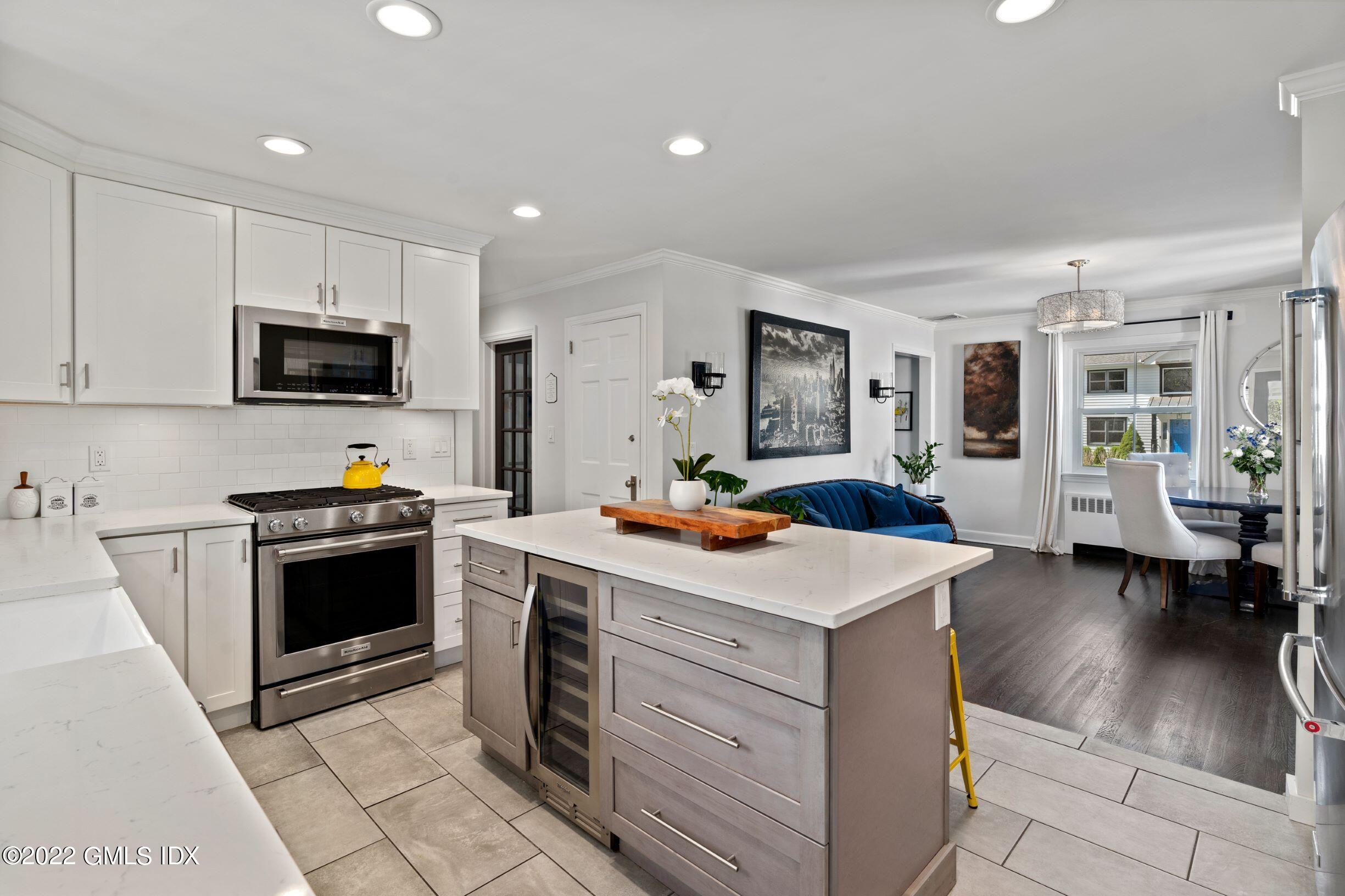 23 Manor Road Old Greenwich, CT 06870 - Photo 4 of 25 a kitchen with a stove and a sink