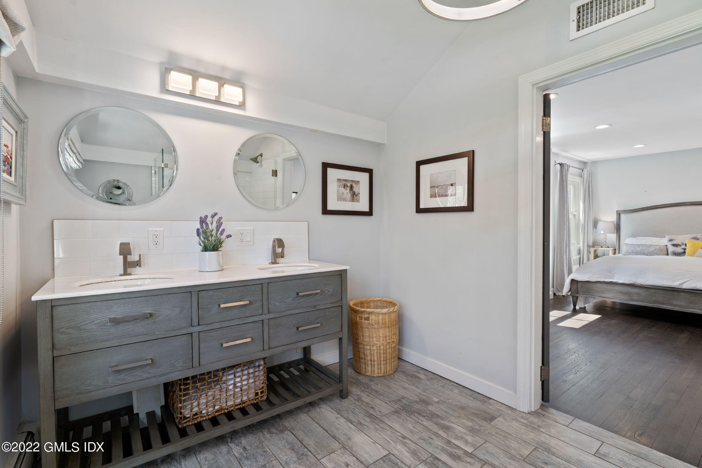 23 Manor Road Old Greenwich, CT 06870 - Photo 10 of 25 a view of room with painting and wooden floor
