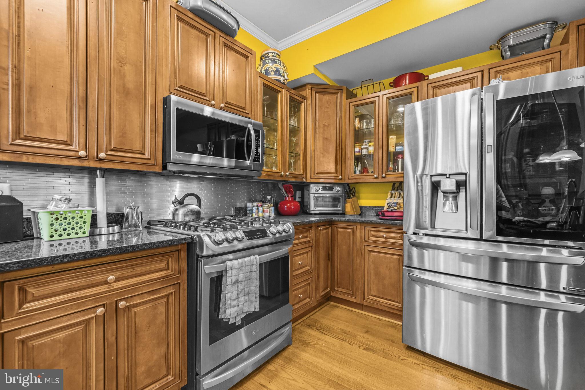 1824 3rd Street Northeast Washington, DC 20002 - Photo 9 of 30 Charming kitchen with vibrant accents.