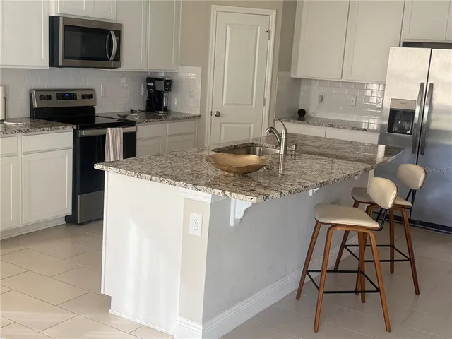 a view of a livingroom with wooden floor