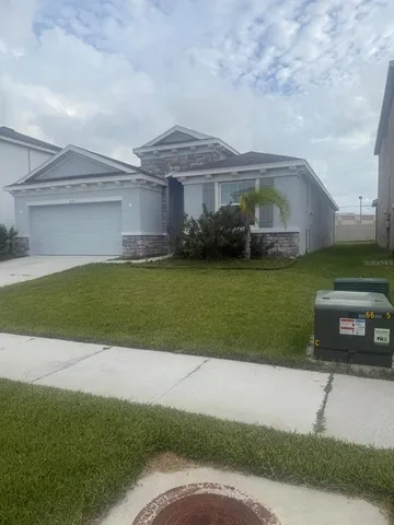 a view of a house with a garden