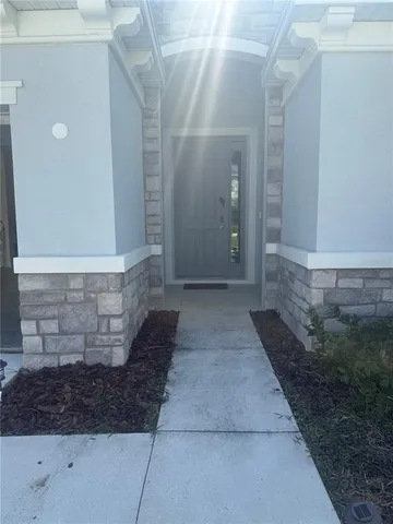 a living room with furniture and a couch