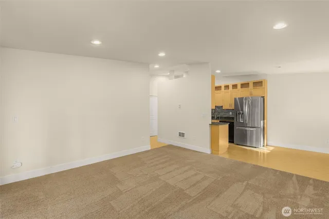 a view of a kitchen with a sink