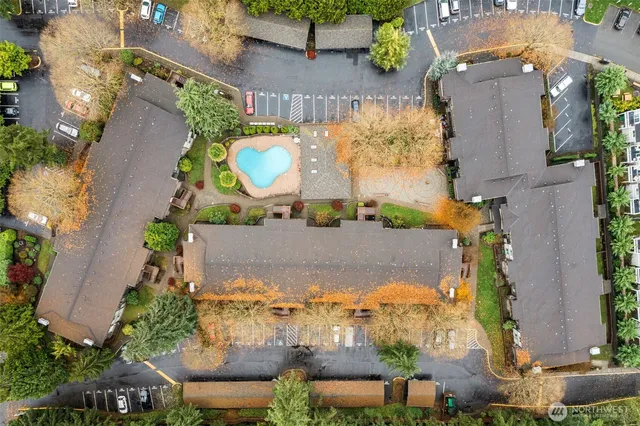 an aerial view of houses with outdoor space