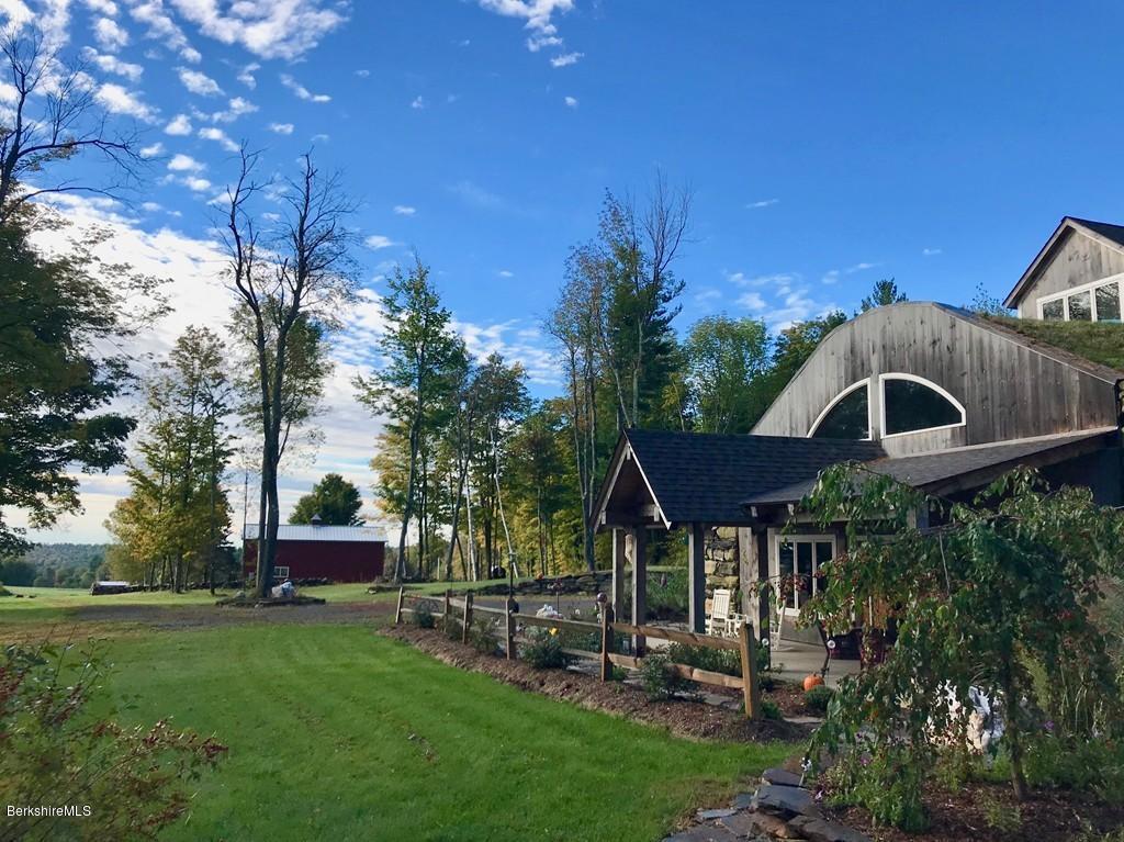 49 Forget Road Hawley, MA 01339 - Photo 2 of 30 a front view of a house with garden