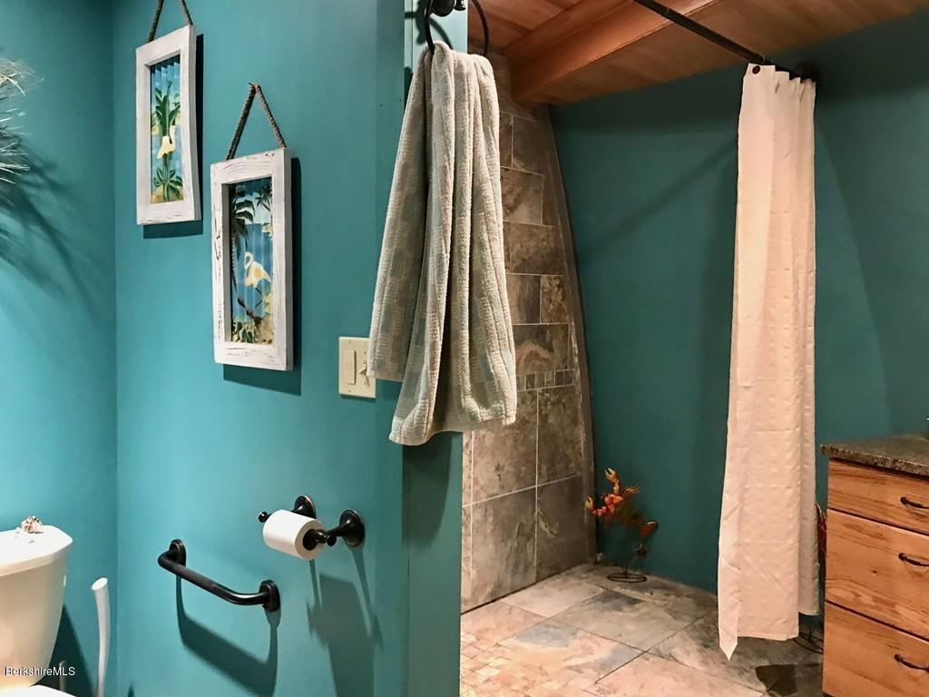 49 Forget Road Hawley, MA 01339 - Photo 20 of 30 a bathroom with a sink and a mirror
