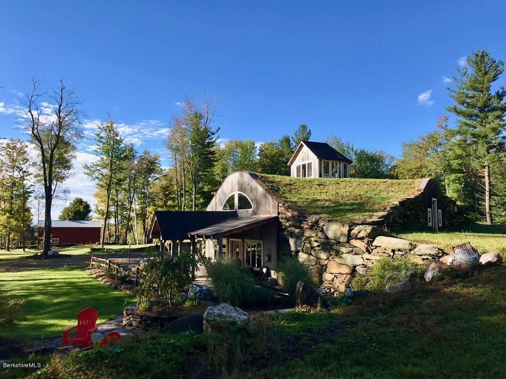 49 Forget Road Hawley, MA 01339 - Photo 3 of 30 a view of a house with a yard and garden