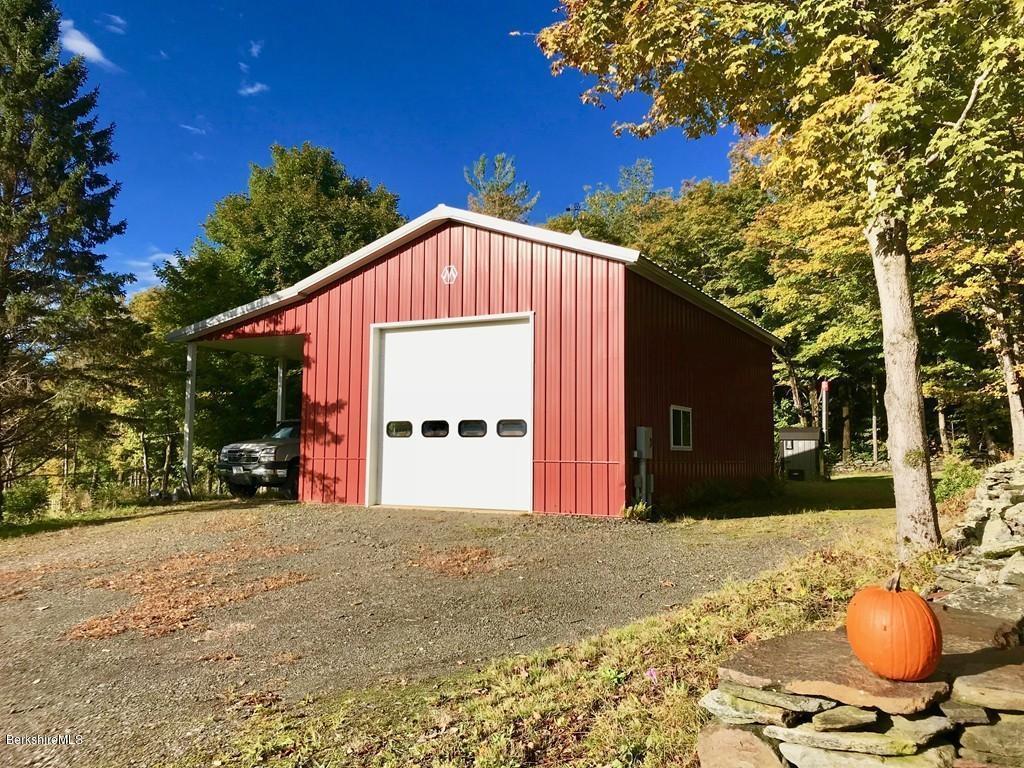 49 Forget Road Hawley, MA 01339 - Photo 25 of 30 a front view of a house with a yard