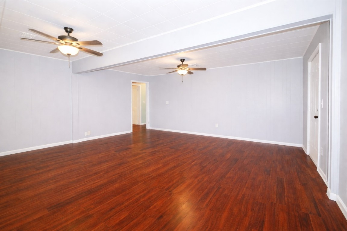 2727 Nelga Road, Unit C Wharton, TX 77488 - Photo 2 of 11 a view of an empty room with wooden floor
