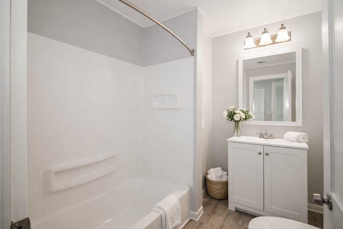 2727 Nelga Road, Unit C Wharton, TX 77488 - Photo 4 of 11 a bathroom with a sink toilet and shower