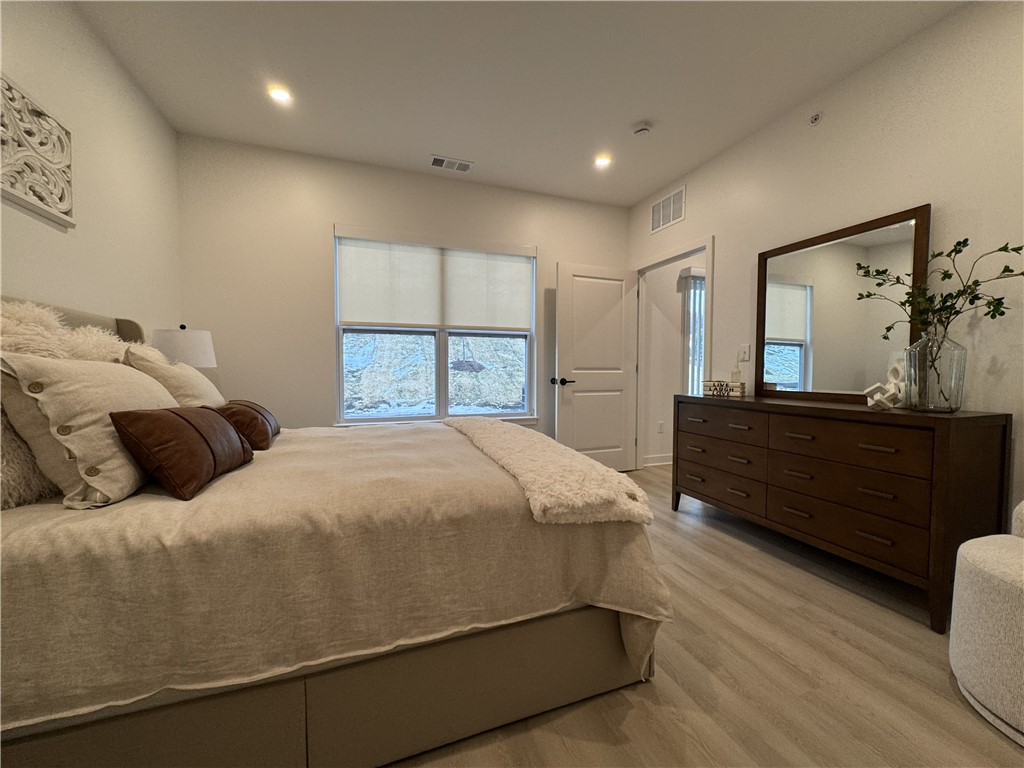 103 Erie Rdg Drive Henrietta, NY 14467 - Photo 7 of 14 Typical spacious primary bedroom with ensuite bath