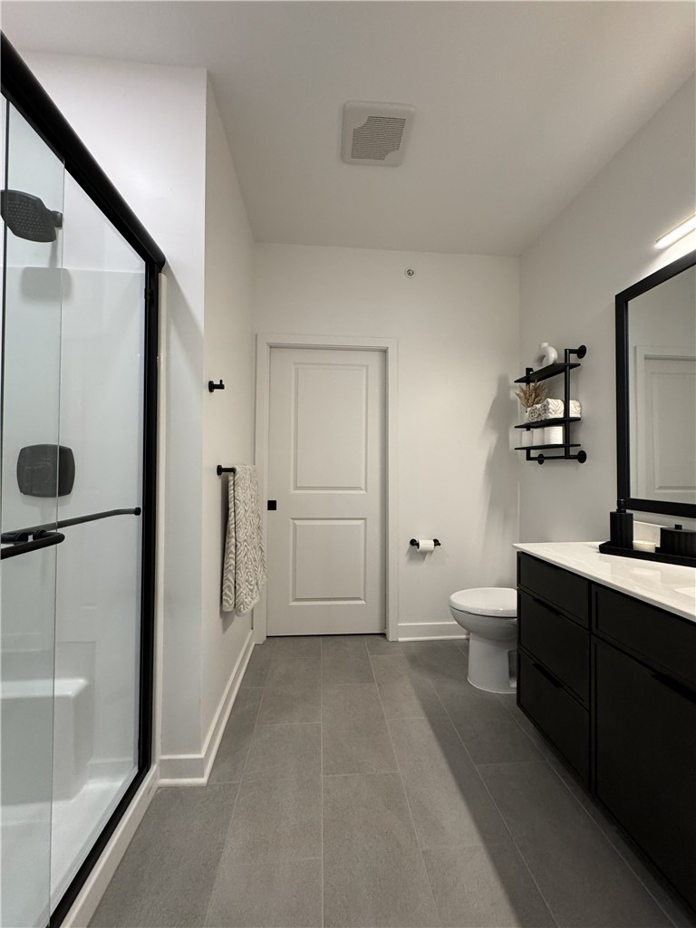 103 Erie Rdg Drive Henrietta, NY 14467 - Photo 9 of 14 Typical ensuite primary bathroom