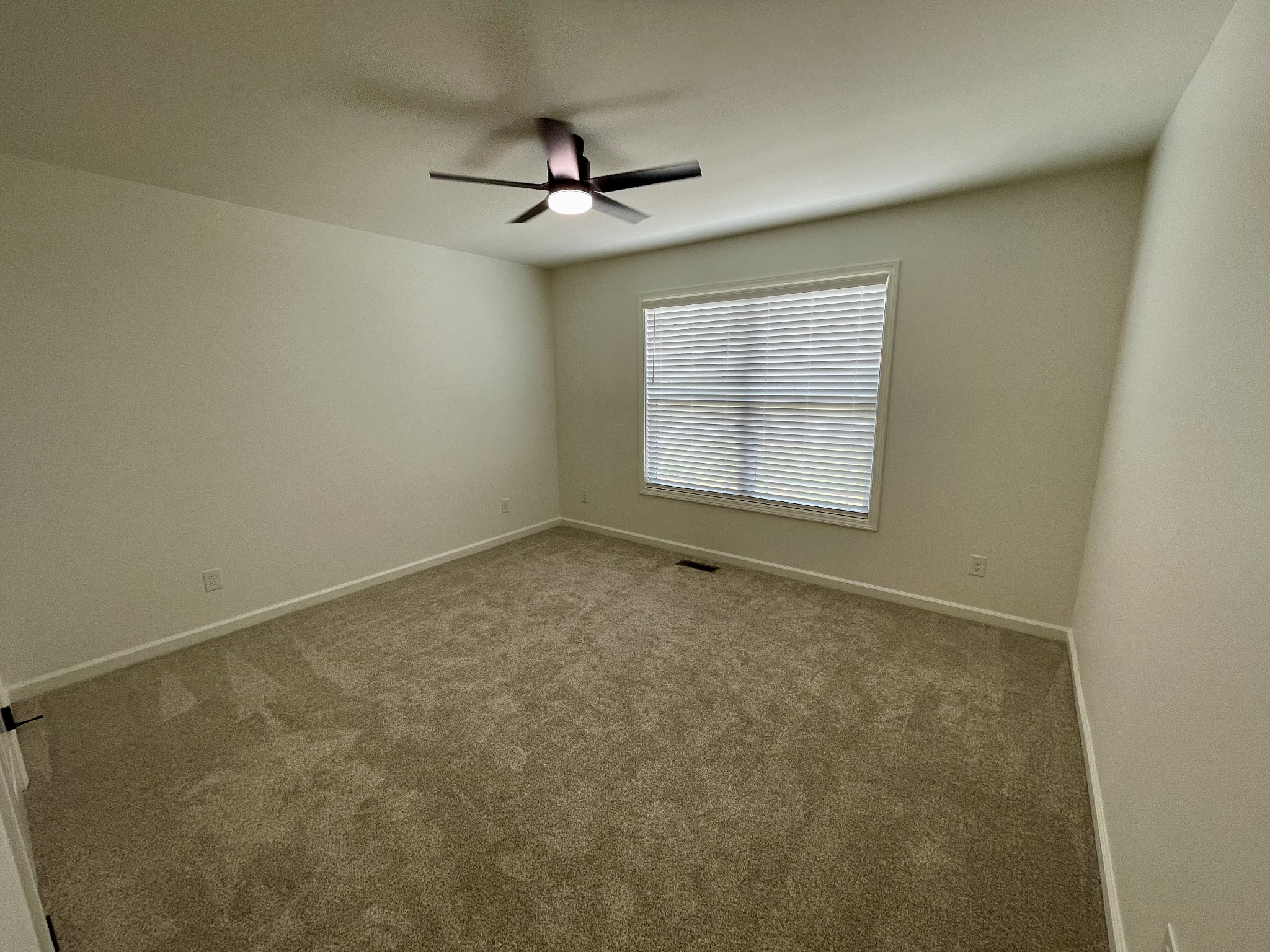 104 Donald Road Lafayette, TN 37083 - Photo 19 of 22 a view of an empty room with a window