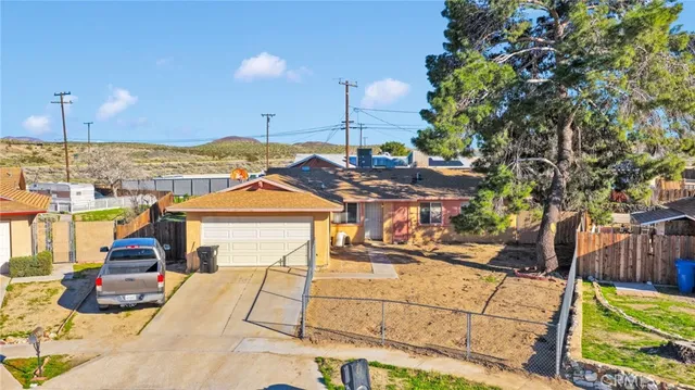 a view of a house with a ocean view