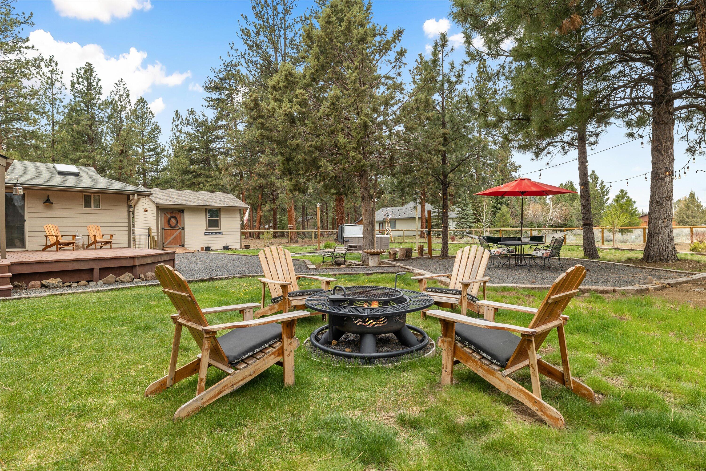 15868 Lundy Road Sisters, OR 97759 - Photo 34 of 53 a swimming pool with outdoor seating and yard
