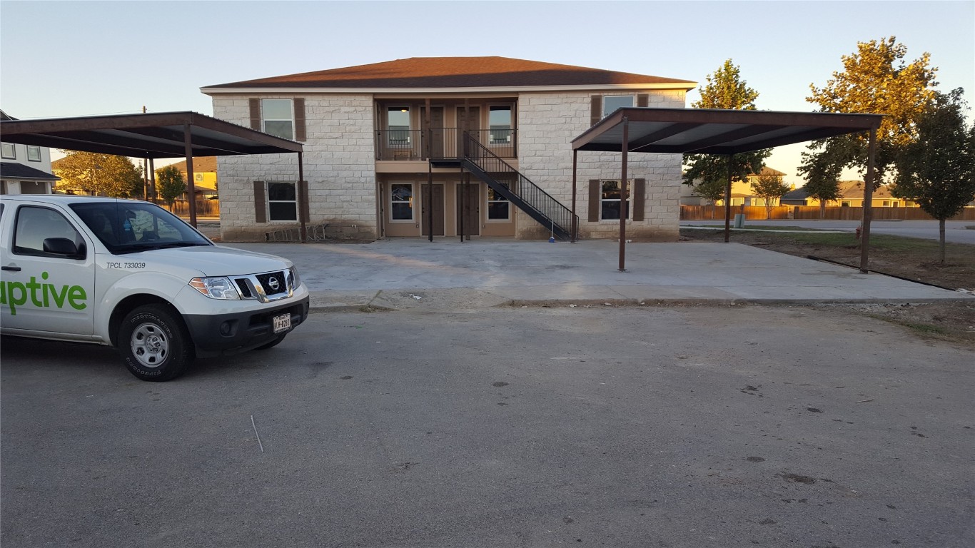 a car parked in front of a house
