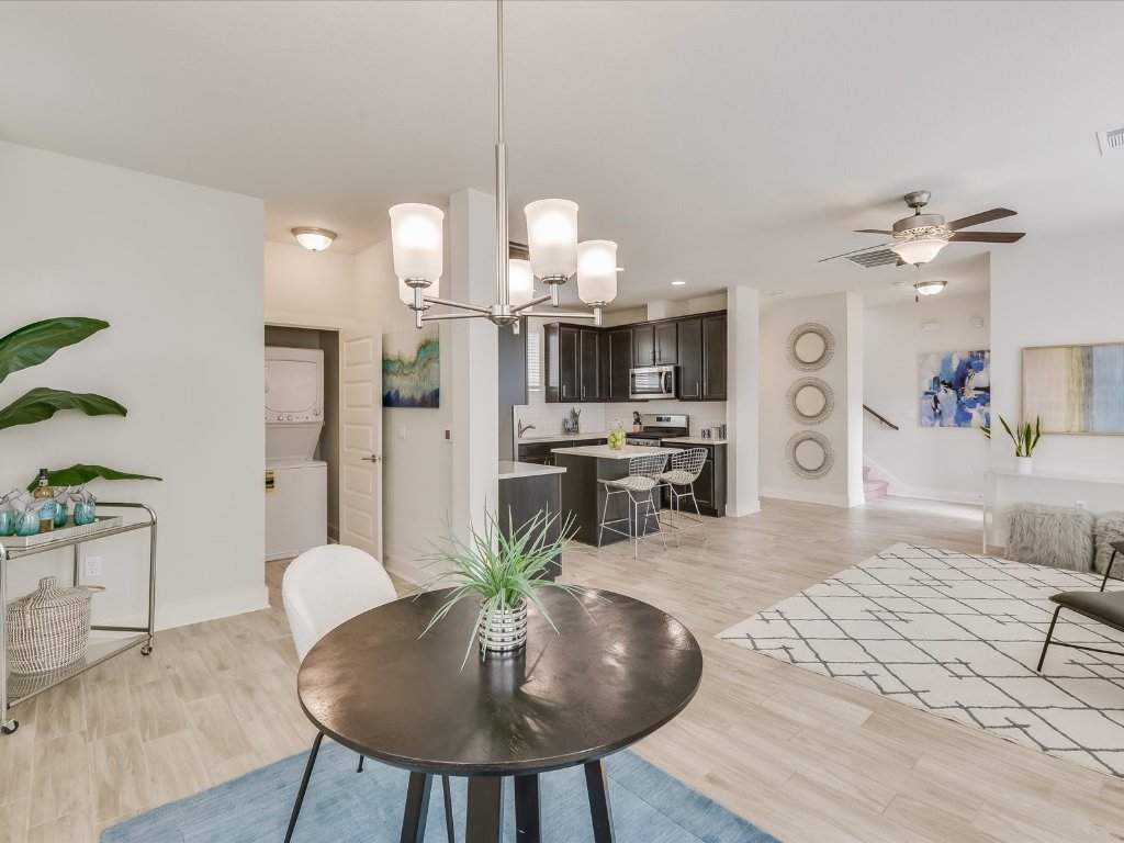 1916 Warely Lane Austin, TX 78741 - Photo 15 of 15 a large kitchen with a table and chairs