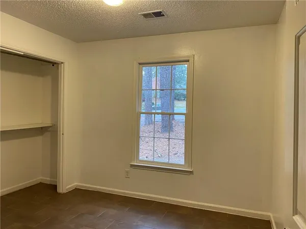 an empty room with windows