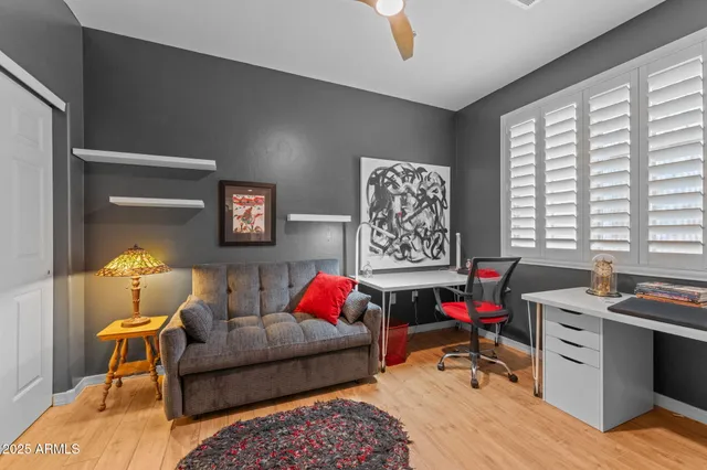 a living room with furniture and a window
