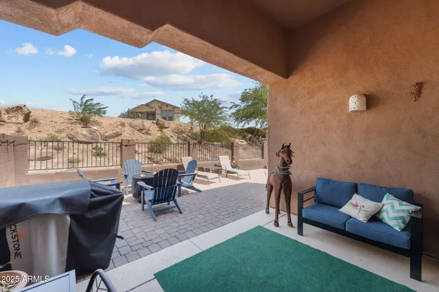 a outdoor living space with furniture and garden view