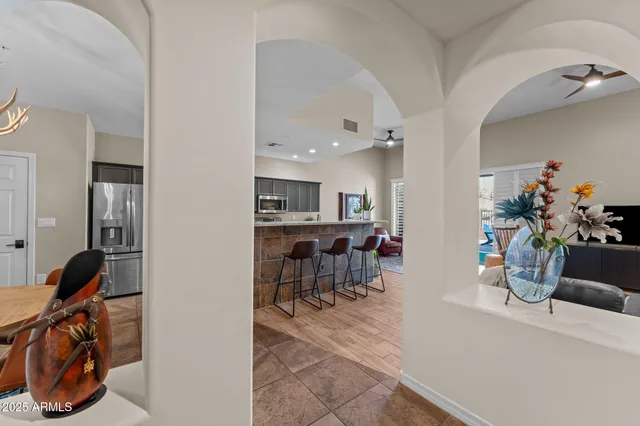 a view of a living room and dining room