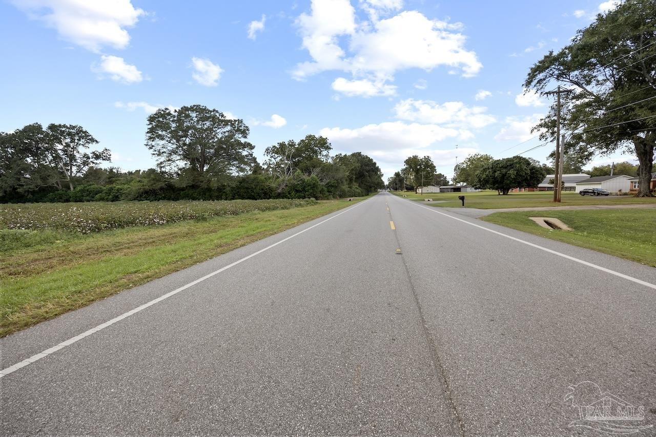 Lot 2 State Highway Jay, FL 32565 - Photo 18 of 26 a view of a golf course with a lake