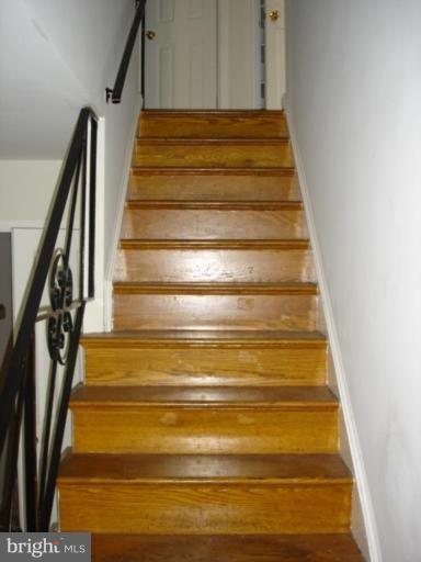 9500 Old Georgetown Road Bethesda, MD 20814 - Photo 6 of 17 View up the front staircase