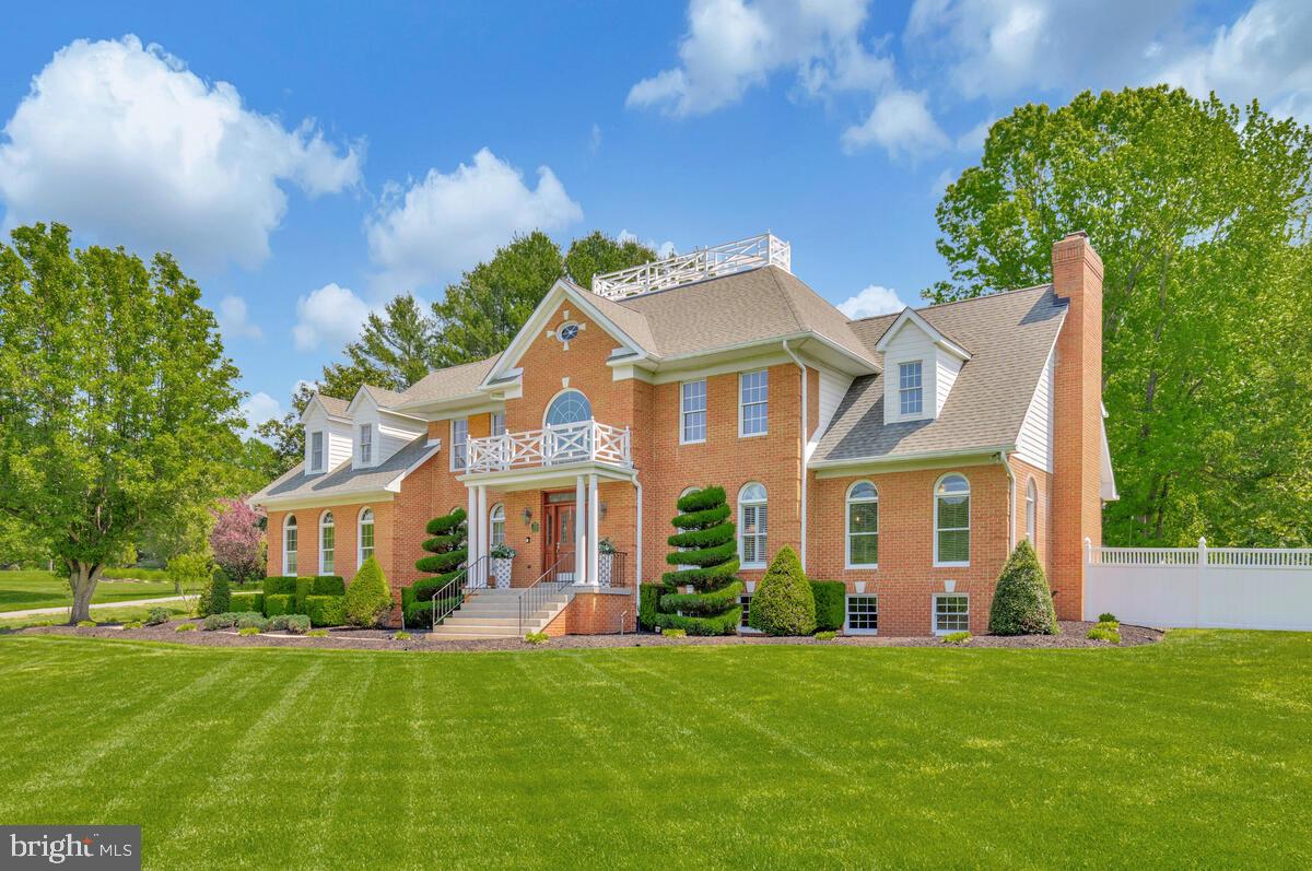 2840 Dunleigh Drive Dunkirk, MD 20754 - Photo 1 of 1 a front view of a house with a garden