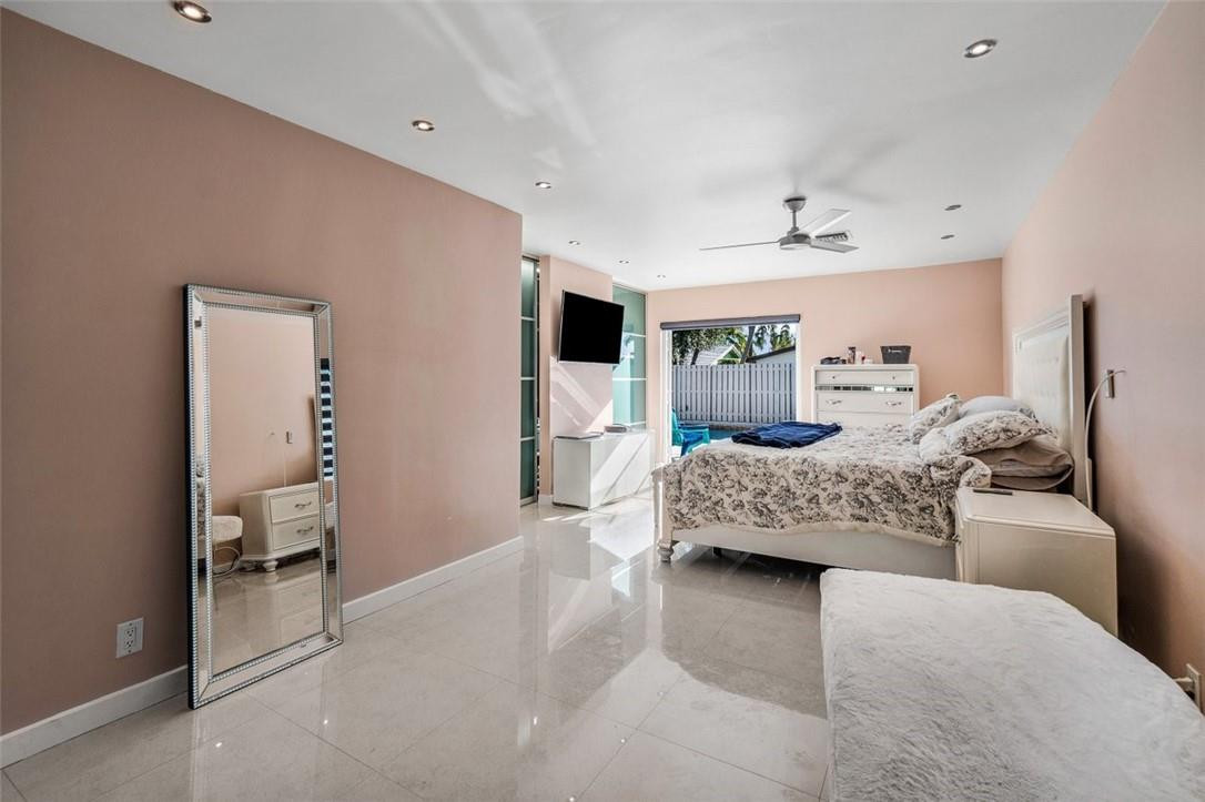 2610 Northeast 43rd Street Lighthouse Point, FL 33064 - Photo 22 of 35 Master BR/ French doors to pool area