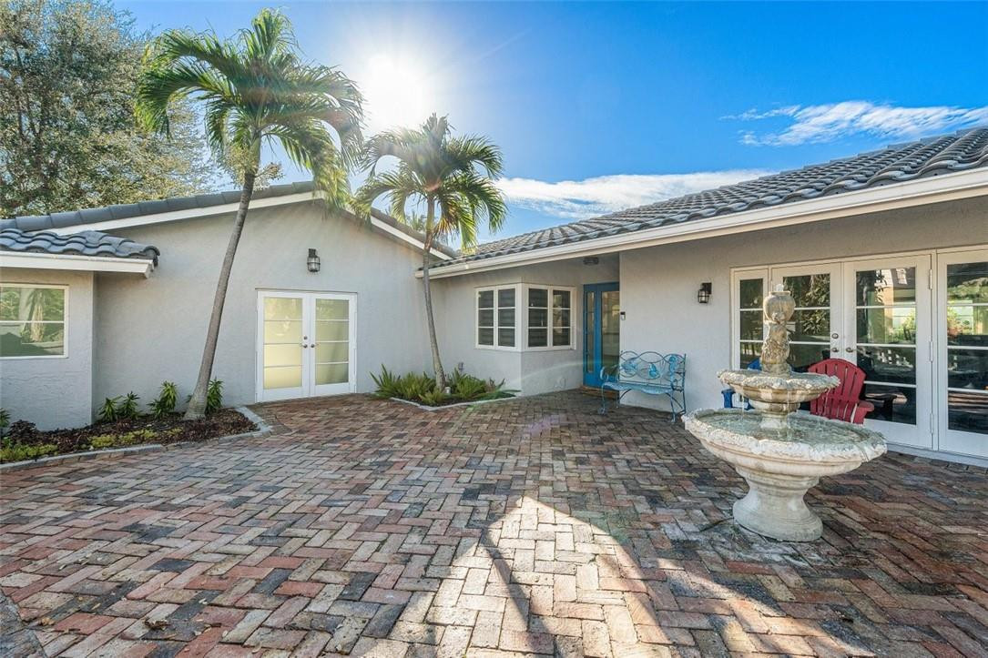 2610 Northeast 43rd Street Lighthouse Point, FL 33064 - Photo 8 of 35 Courtyard Entryway
