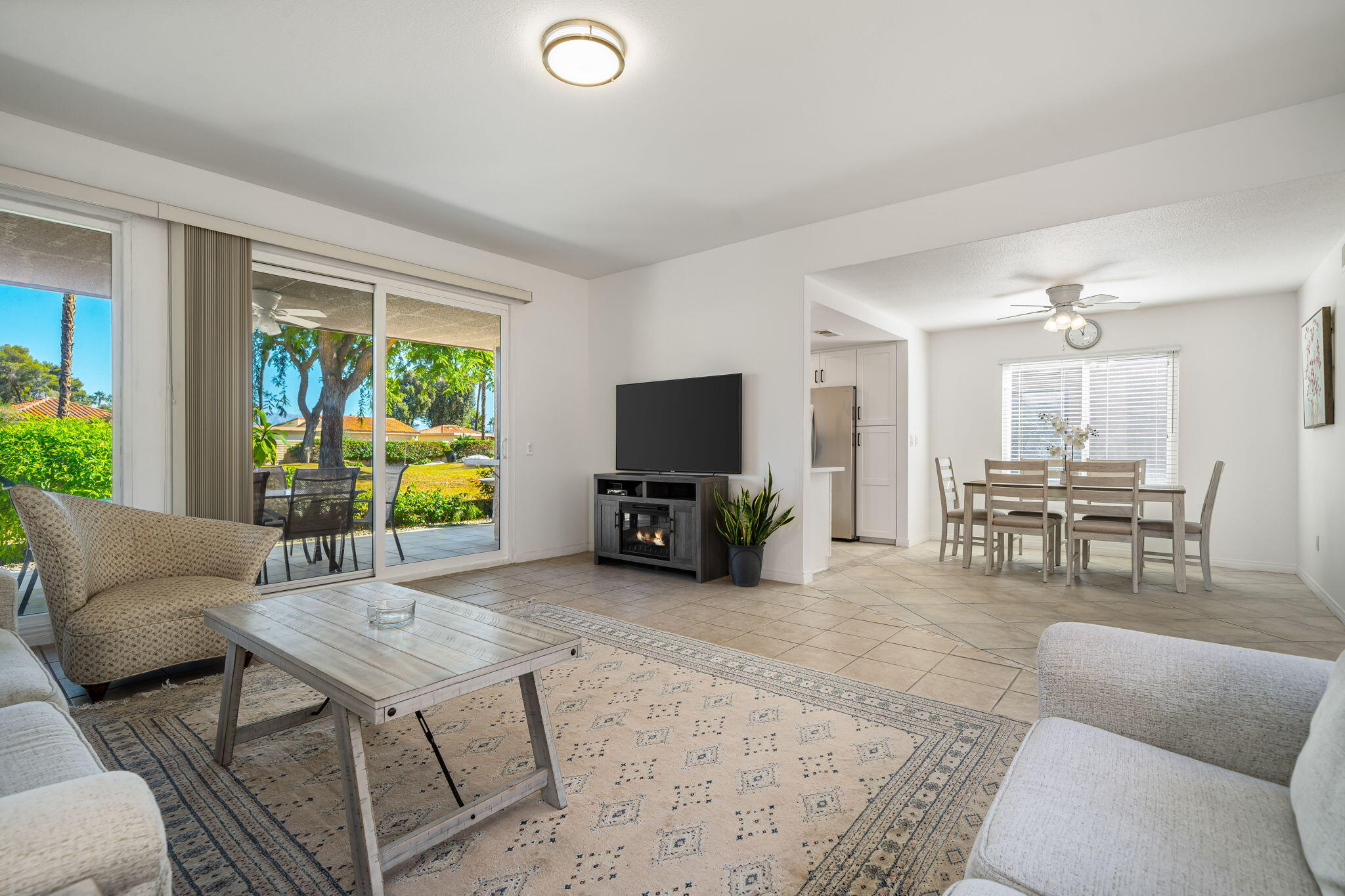 38 Malaga Drive Rancho Mirage, CA 92270 - Photo 2 of 22 a living room with furniture and a flat screen tv