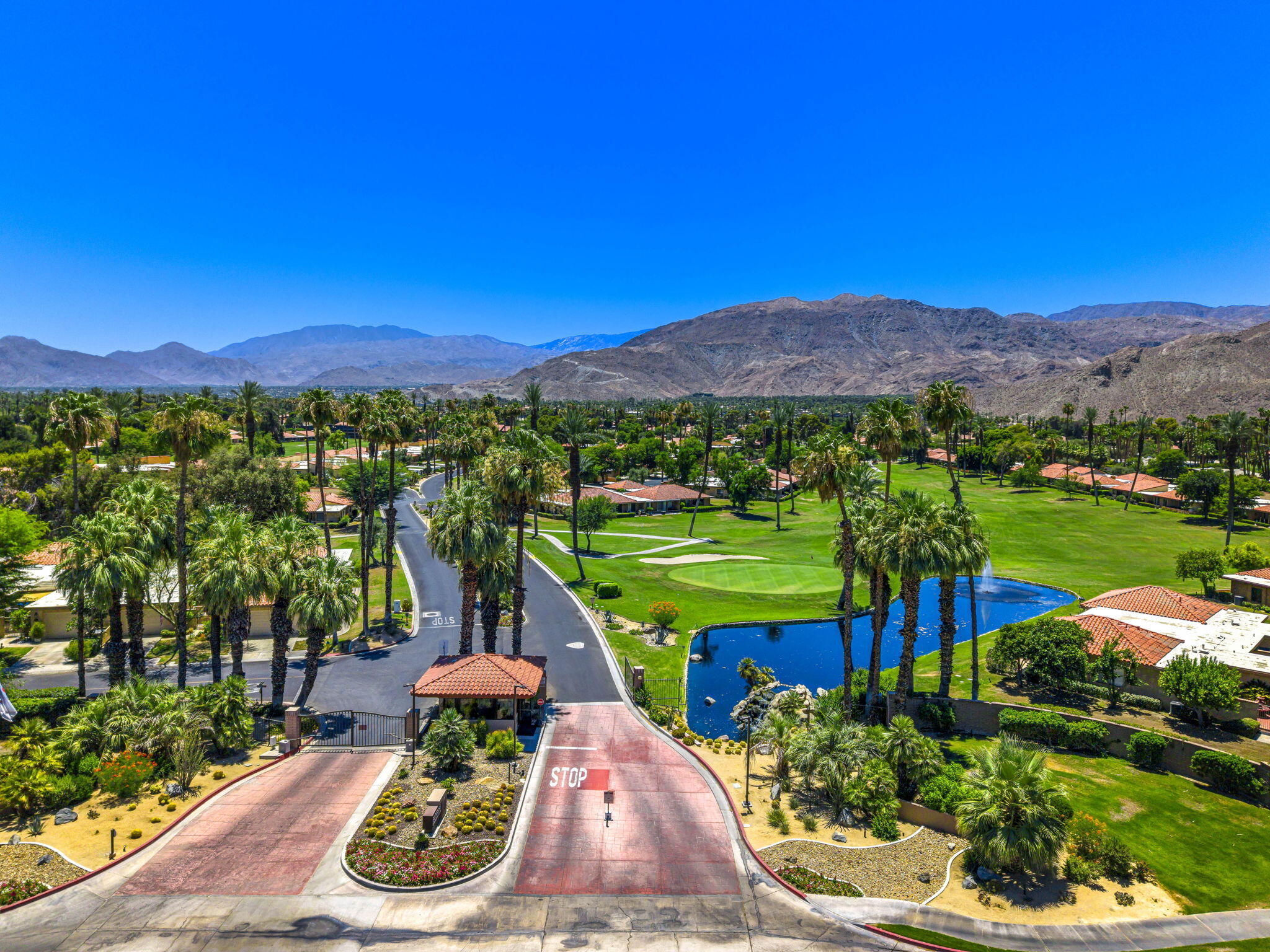 38 Malaga Drive Rancho Mirage, CA 92270 - Photo 21 of 22 a view of a city with a lake