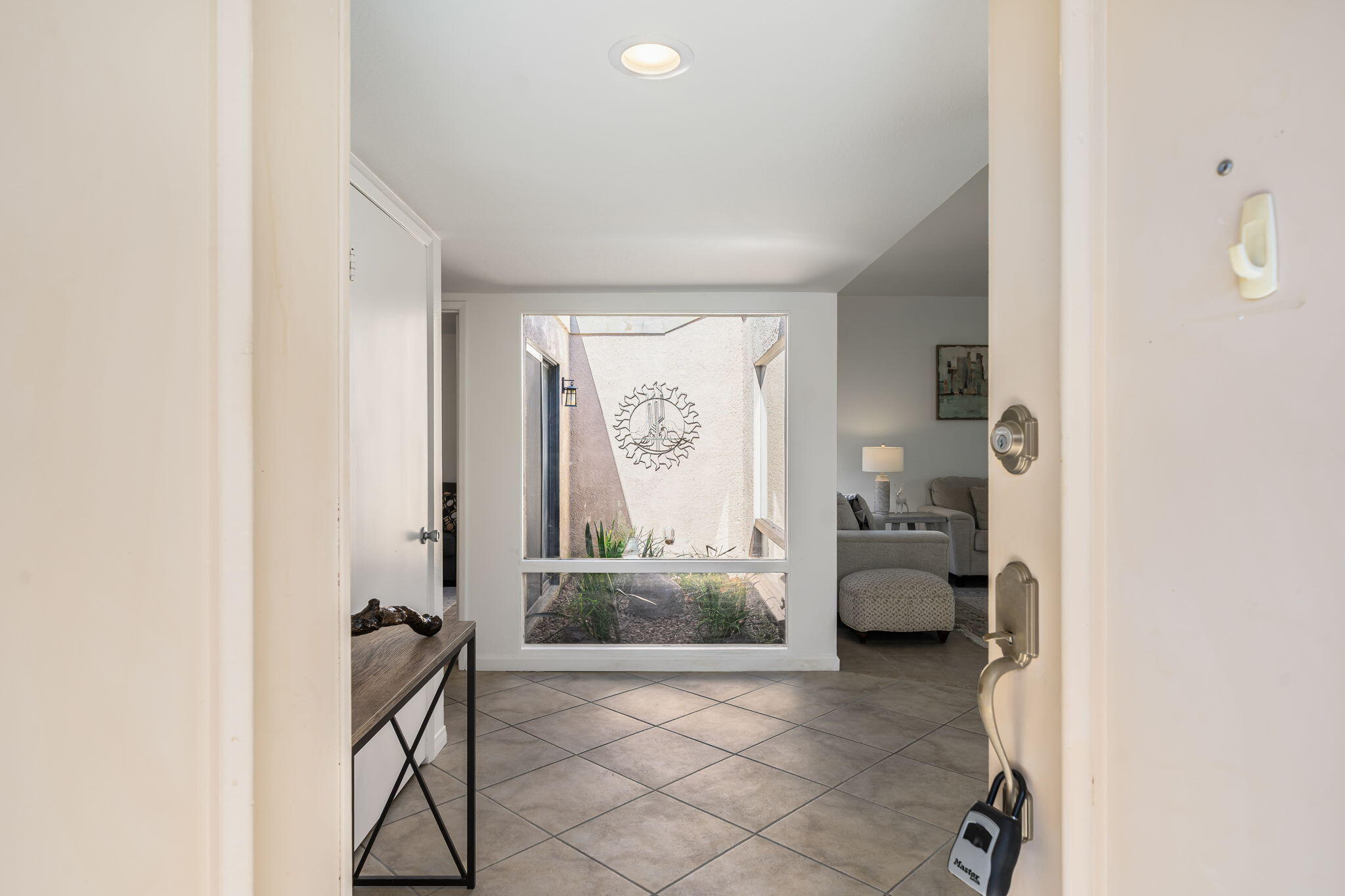 38 Malaga Drive Rancho Mirage, CA 92270 - Photo 6 of 22 a view of entryway with livingroom and furniture