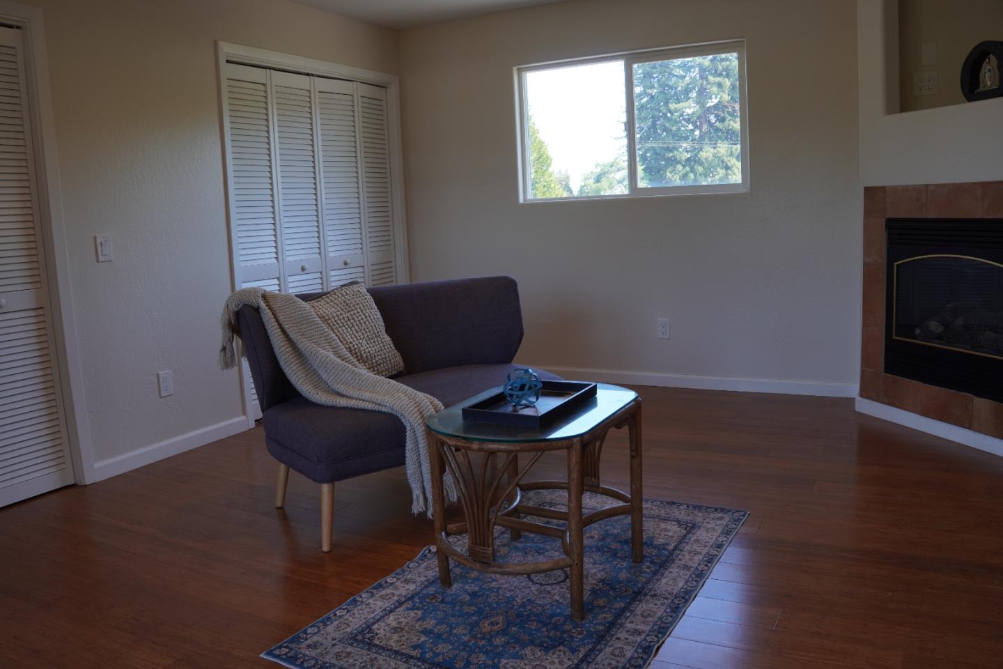 389 Corralitos Road Watsonville, CA 95076 - Photo 14 of 18 a view of a workspace with furniture and a window