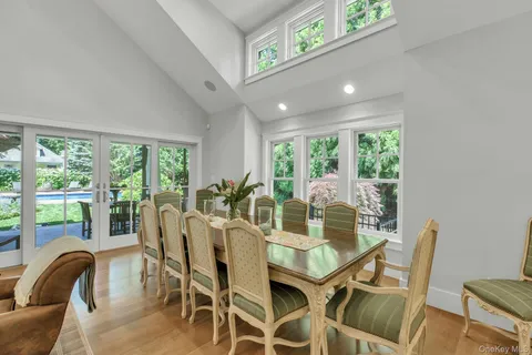 a view of a dining room with furniture window and outside view